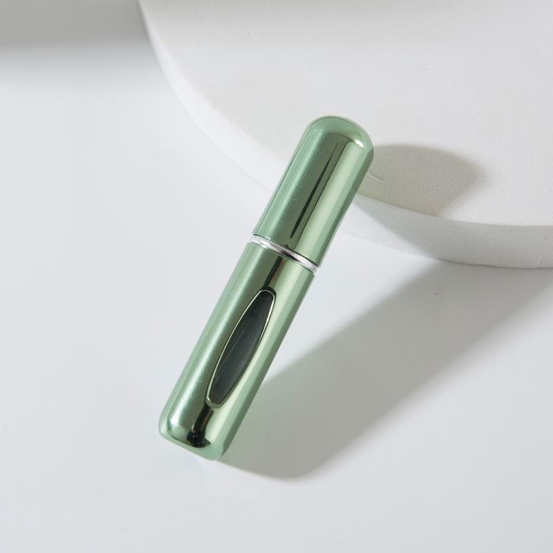 Compact 5ml Self-Pump Spray Perfume Bottle with Aluminum Press Design