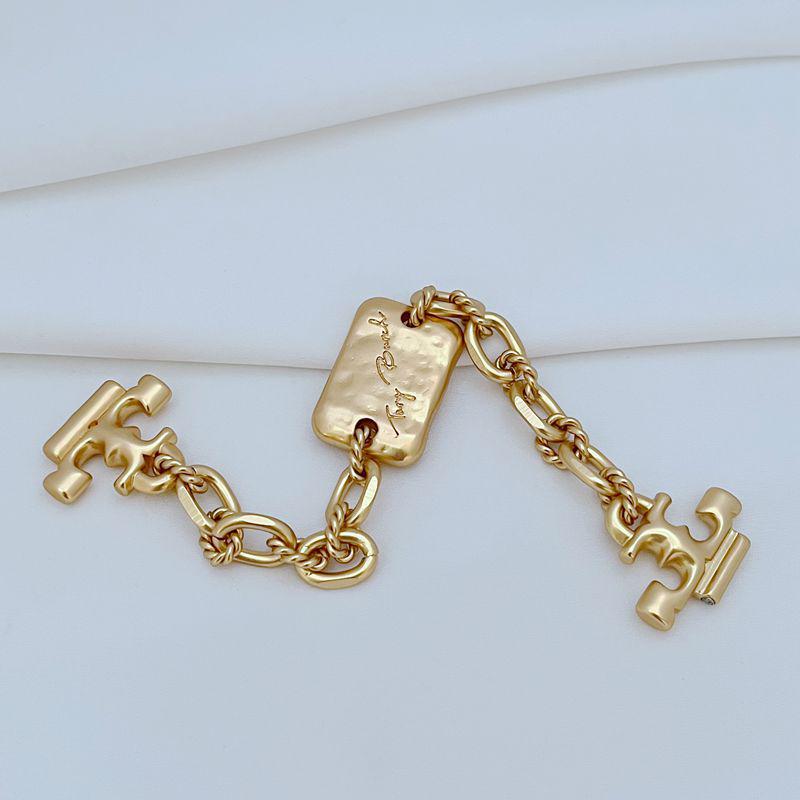 Шикарный браслет-цепочка с крупными звеньями и металлической биркой в стиле легкой роскоши