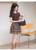 2026 Girls' Leopard Print Two-Piece Set: Short-Sleeved Top & Pleated Skirt