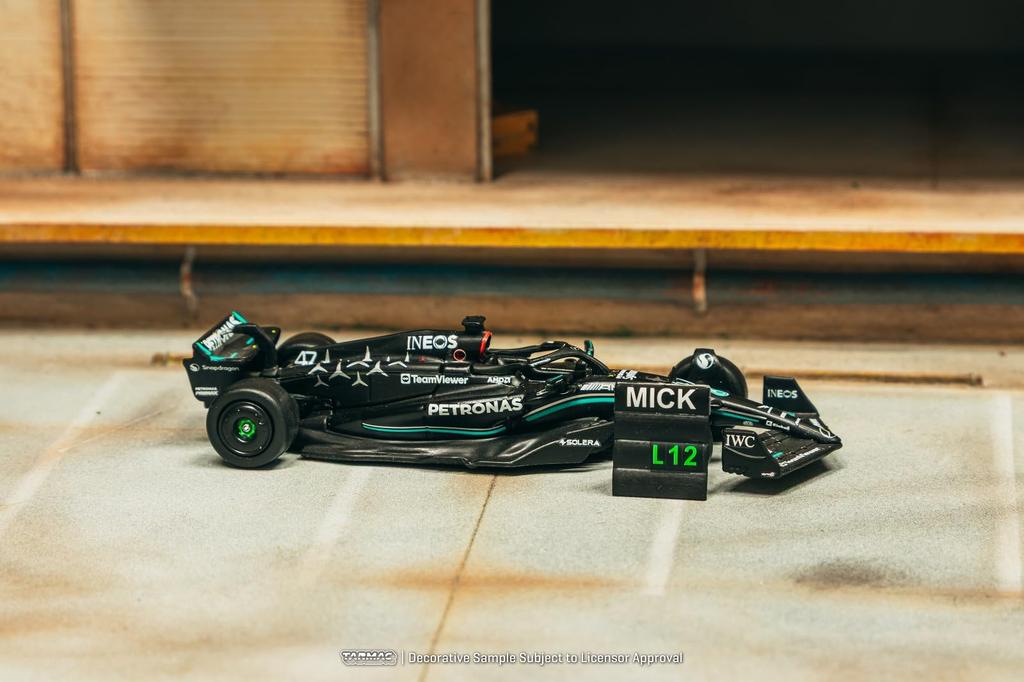 Speedmaster Japan TARMACWORKS F1 W14 E Performance Гран-при Испании Тестирование шин 2023 Мик Шумахер 1/64 Mercedes-AMG (Готовая модель)