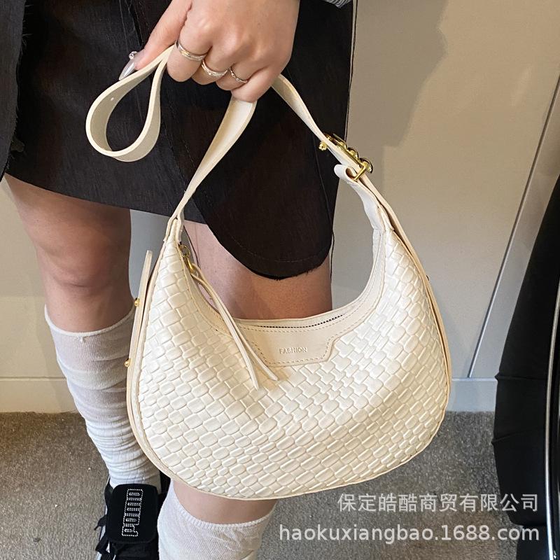 Large capacity bag women's spring and summer versatile 2025 new fashion niche design single shoulder messenger bag commuter dumpling bag