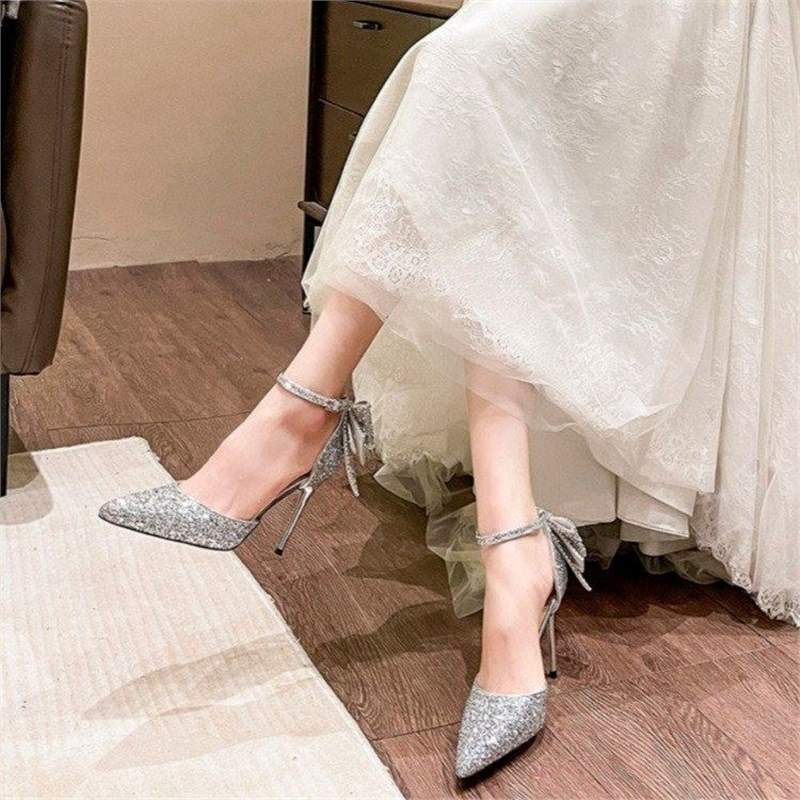 Серебряные туфли на высоком каблуке, лето 2024, женские, новые, красивые, с блестками, с острым каблуком-бантом, свадебные туфли
