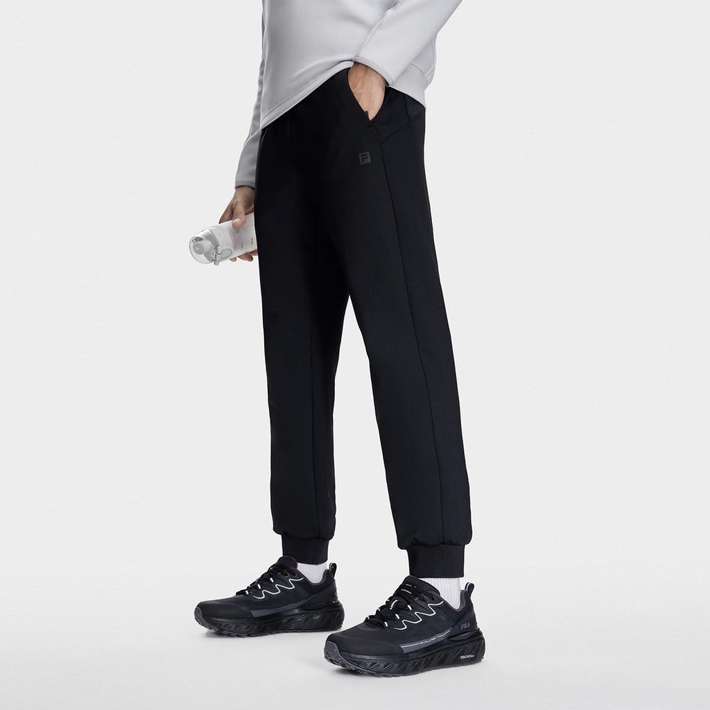 Fila Однотонные эластичные вязаные спортивные брюки с манжетами для мужчин, низ, глубокий черный A11M341605F-BK
