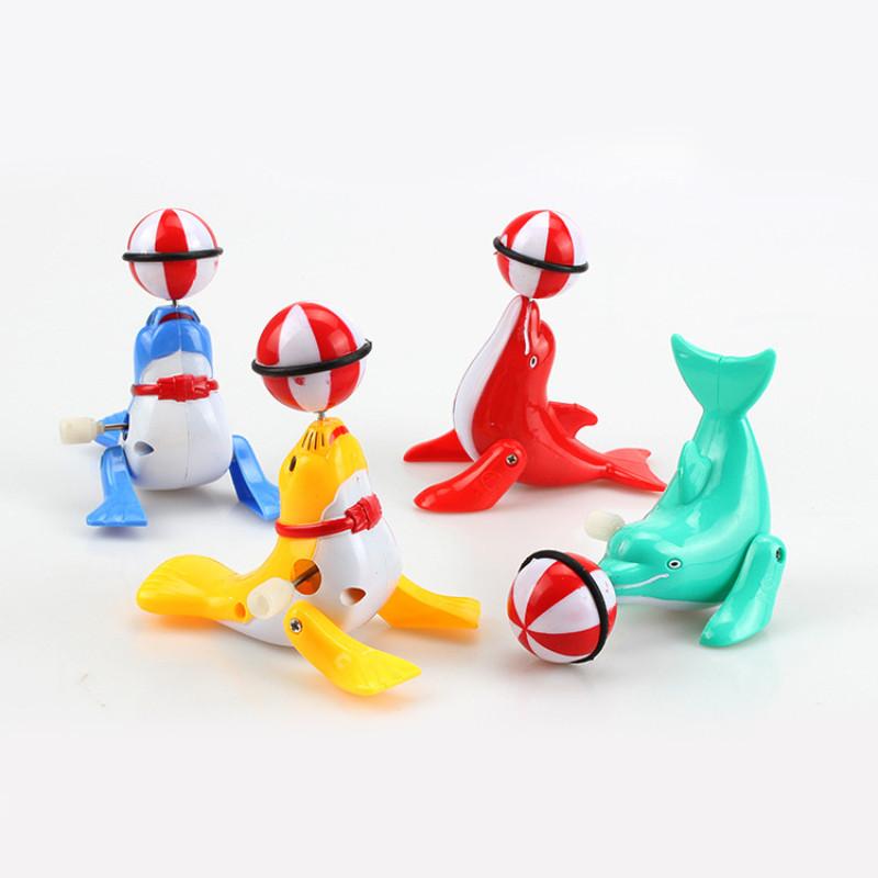 Mechanical Dolphin Rotating Toy With Chain Link Top Ball For Kids Learning And Interactive Play