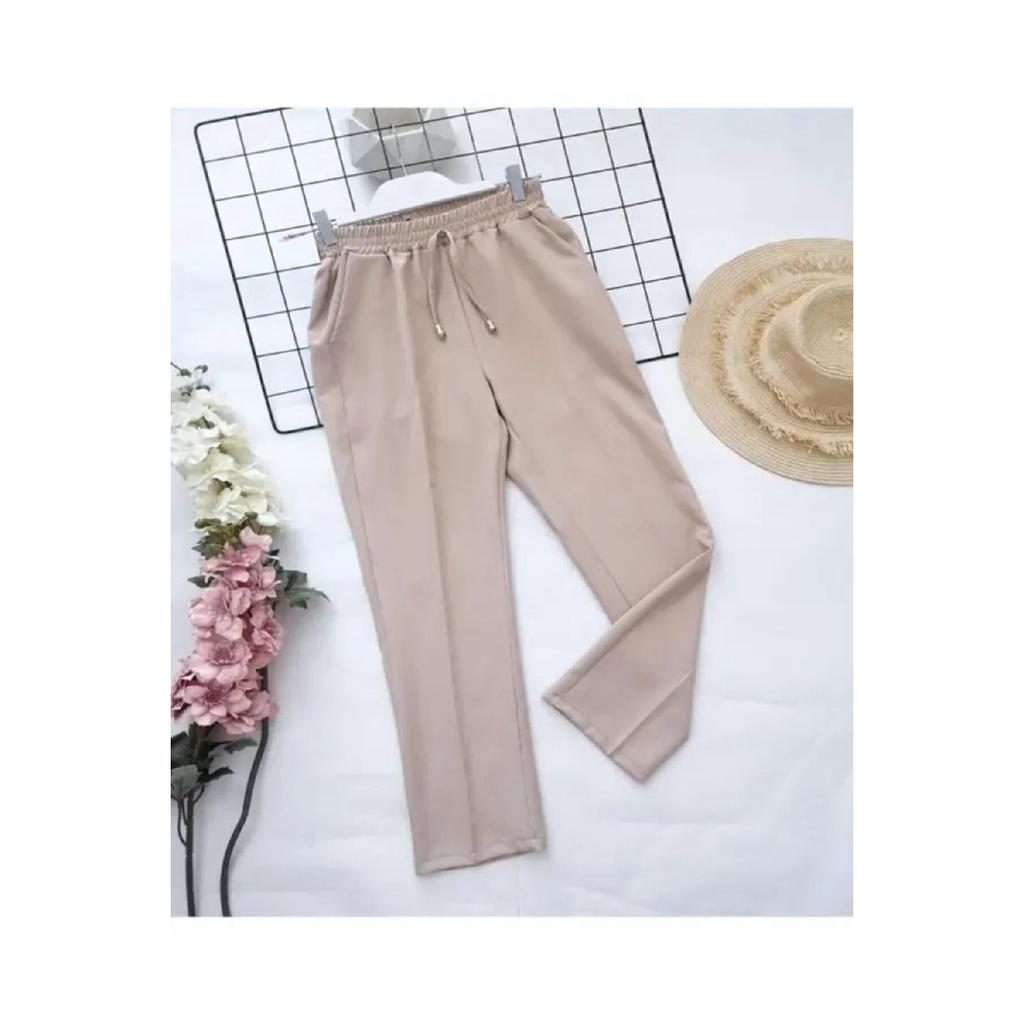 Женские эластичные брюки-морковки