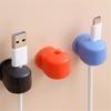 Держатели кабелей Хороший гладкий край 3 цвета Держатели кабелей Многофункциональные органайзеры для кабелей в форме кулака Украшение Держатели кабелей для дома