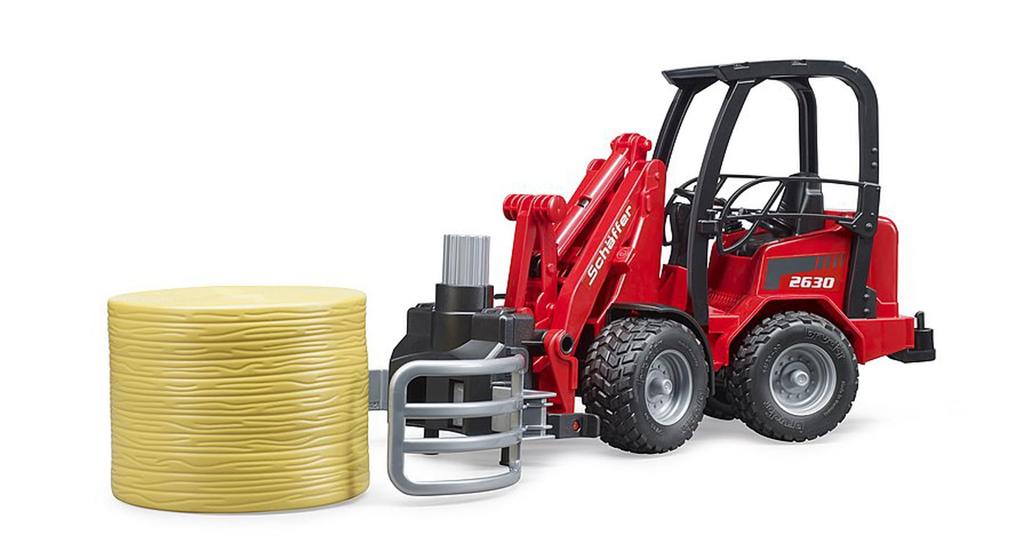 BRUDER Компактный погрузчик Schaffer и захват для тюков с соломой