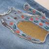 Джинсы женские весна и осень корейская версия большого размера с вышитыми нашивками в виде мяса и мультфильмов в стиле вестерн шаровары с девятью точками