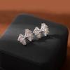 Серьги-клипсы "Серебряная игла" с элегантным бантом - Плиссированный асимметричный дизайн для утонченных женщин