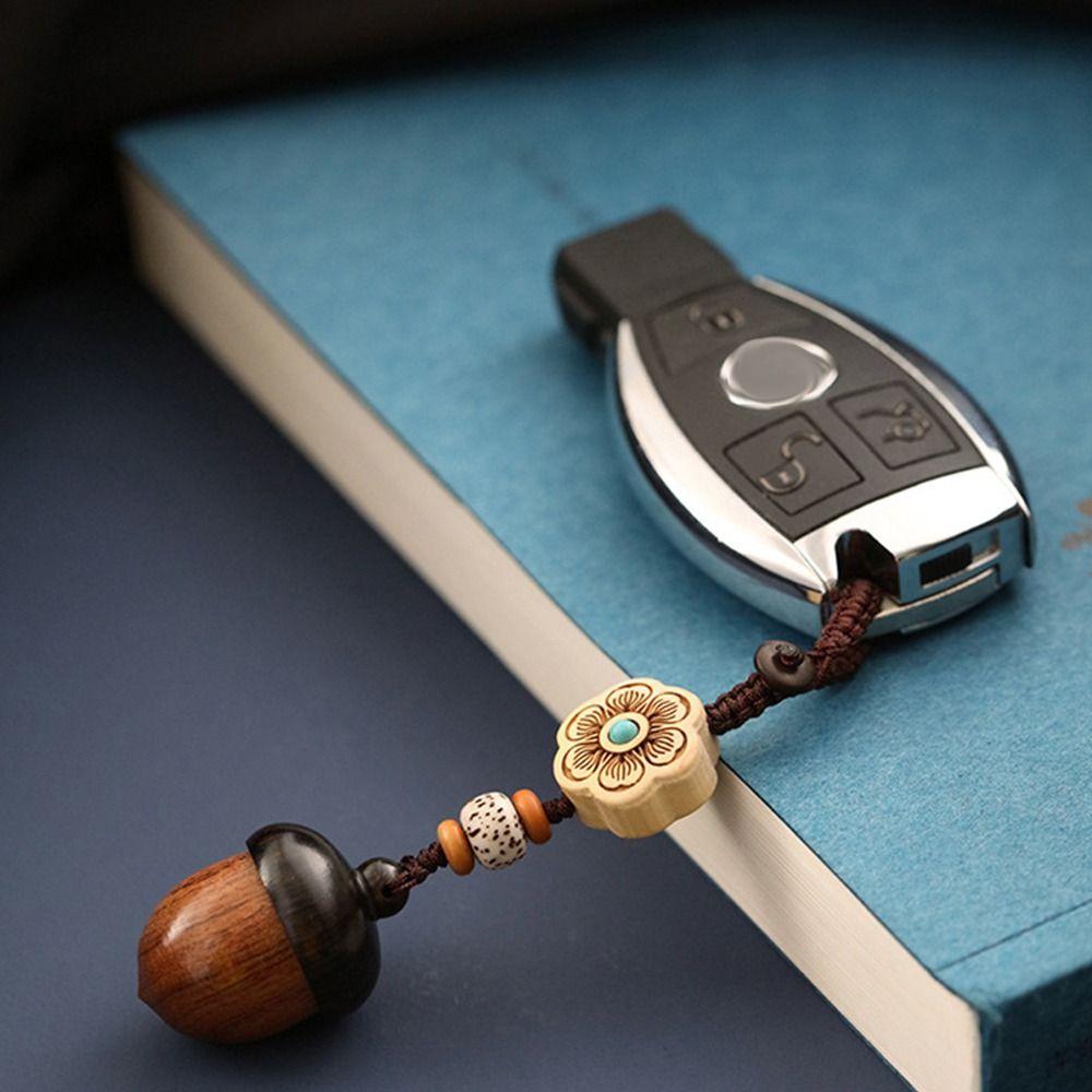 Брелок для ключей из сандалового дерева в китайском стиле с открывающейся крышкой в виде шишки