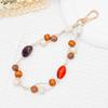 Unique Acrylic Wooden Bead Mobile Phone Strap KeyChain Phone Charm Hanging Wristband for Women's Cell Phone Case Decoration Gift