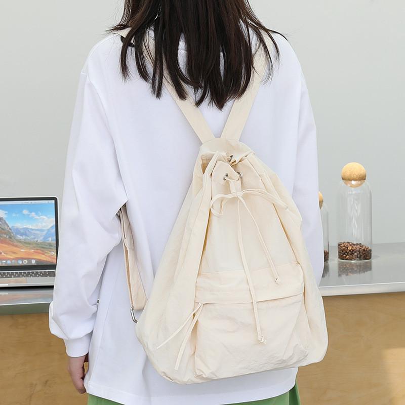 IELGY Korean Version of Casual Literary Canvas Backpack, Fashionable Nylon Solid Color Small Fresh Drawstring Backpack