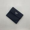 Used Excellent condition Prada bi-fold wallet, triangular logo, Tessuto nylon, black
