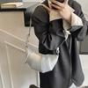 Нишевая сумка женская весна-лето 2025 новая модная на одно плечо кроссбоди сумка-круассан высококлассная подмышечная сумка-пельмень