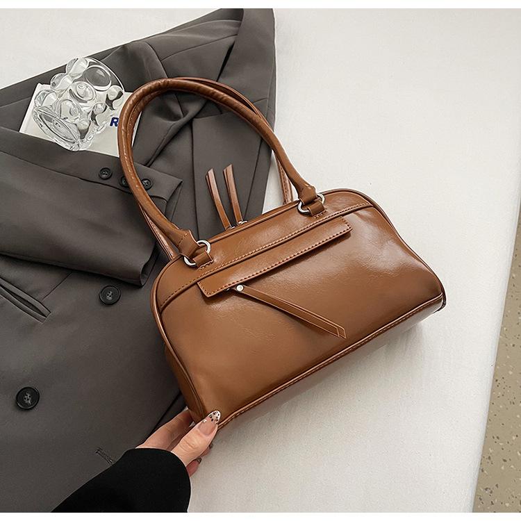 Трендовая нишевая сумка подмышкой, женская сумка для поездок на работу 2024 года, новая простая ретро-сумка для боулинга, универсальная сумка через плечо