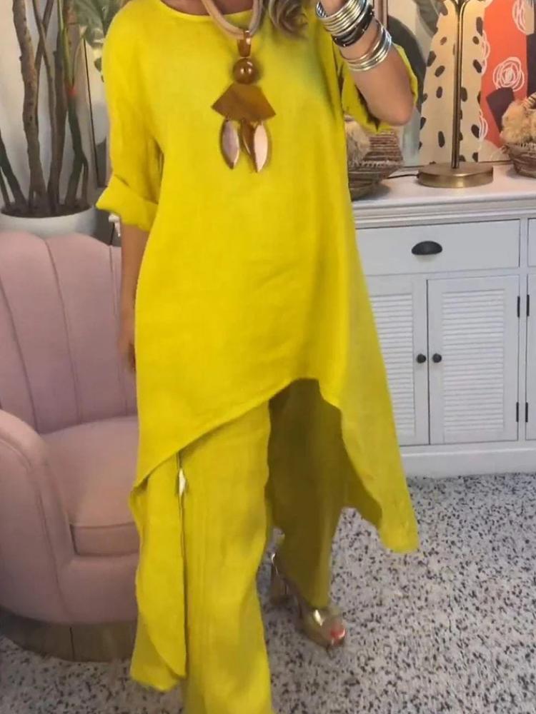 Женский комплект из свободной блузки с асимметричным подолом и брюк широкого кроя в нескольких цветах