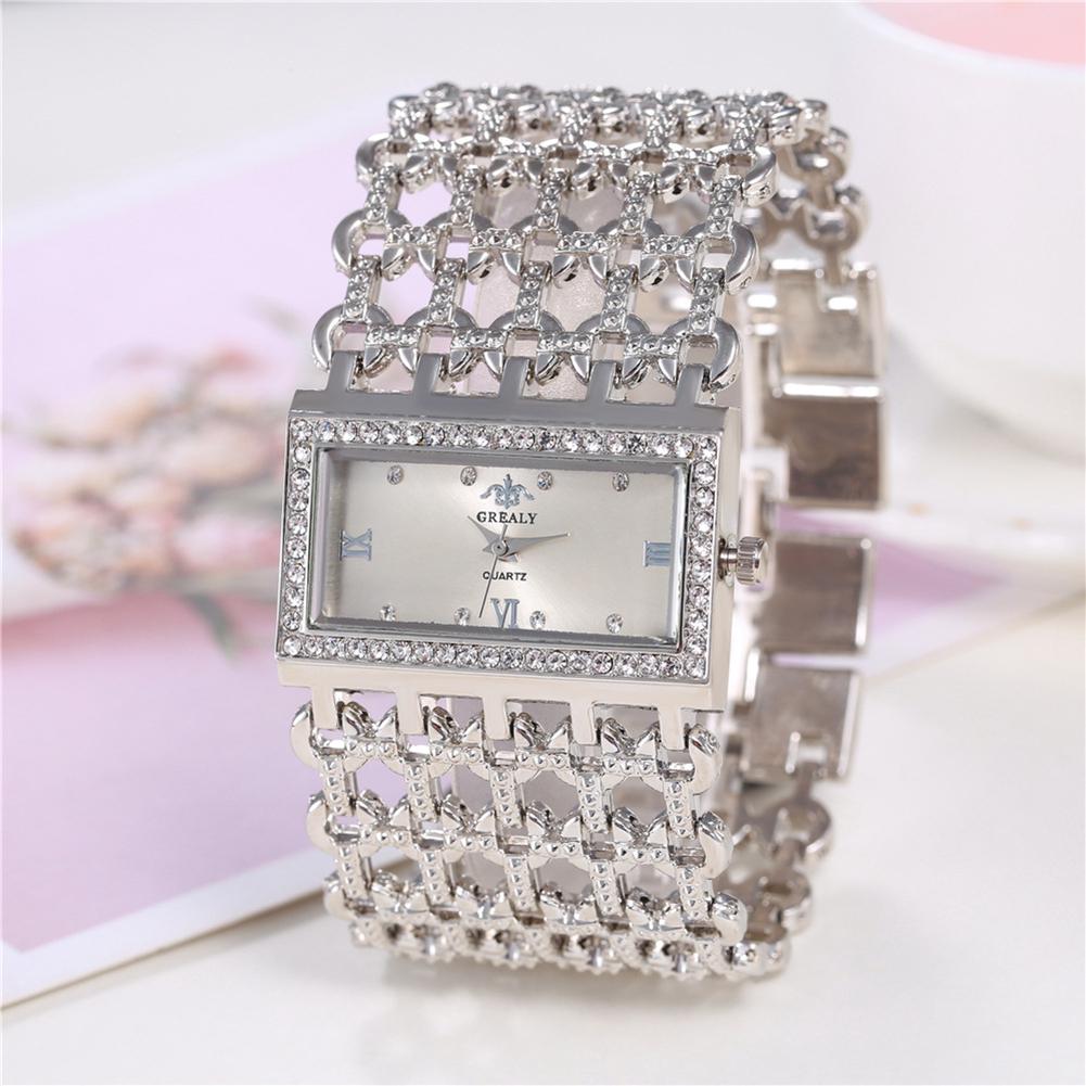 Женские кварцевые часы с широким ремешком