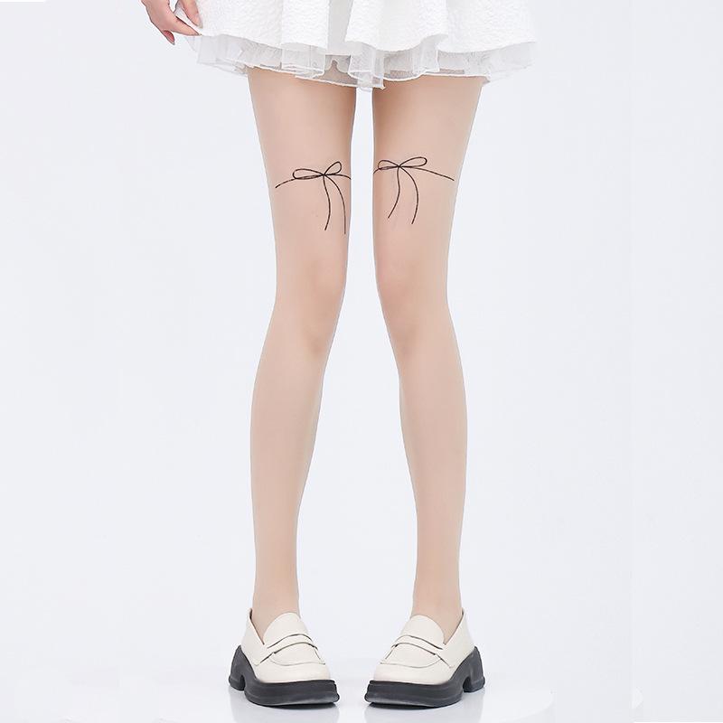 Женские колготки с татуировкой в виде бантика - Прозрачные, телесного цвета, черные шелковые чулки