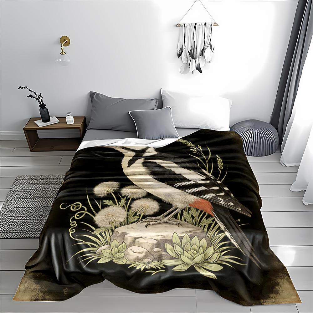 Woodpecker Nature blanket with Floral Artwork and Black Background blanket, suitable for use in the bedroom, living room, on the sofa