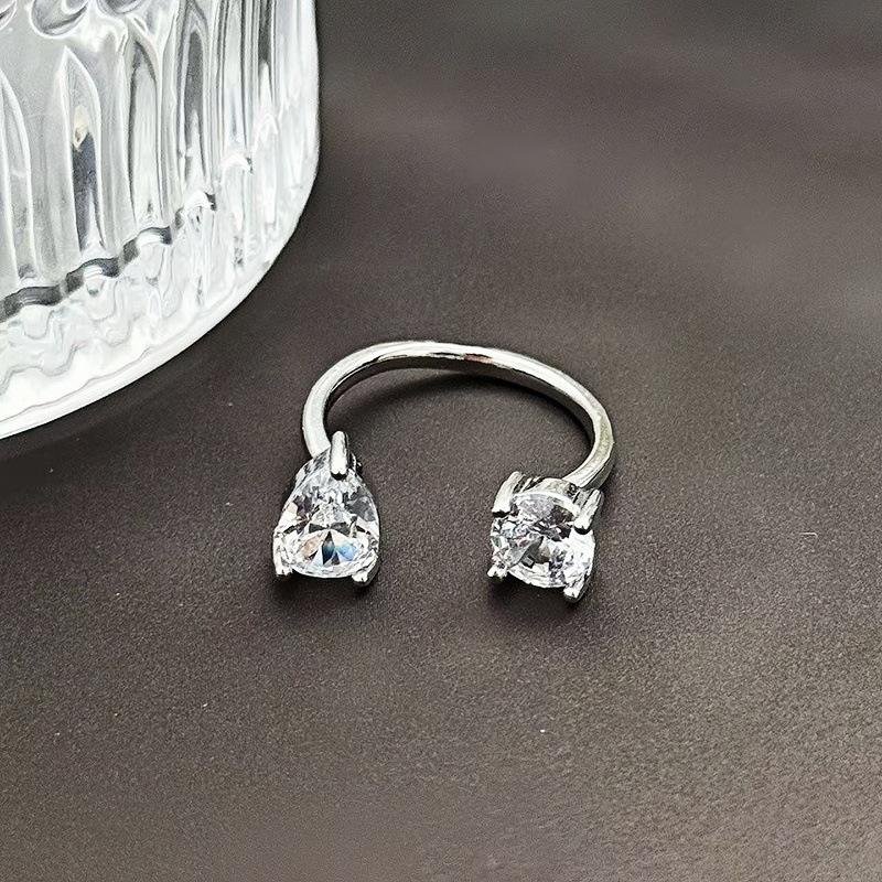 Звездный свет на кончике пальца~ Взрывное кольцо с цирконом с двойной головкой Женское нишевое дизайнерское кольцо для суставов Легкая роскошь Продвинутое чувство Кольцо для ношения в несколько рядов