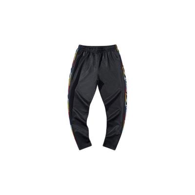 Спортивные брюки мужские Li Ning с логотипом и боковой полосой, черные AKLQ087-2