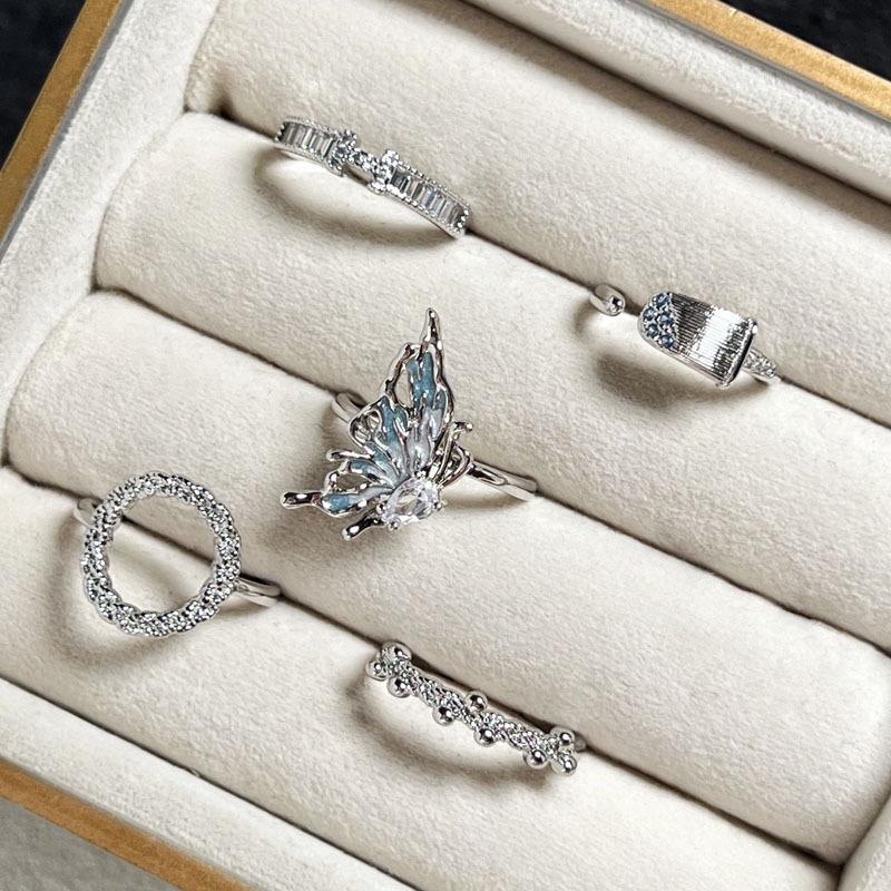 Irregular pleated texture Minimalist Korean flapper butterfly open ring Female alphabet full diamond fashion niche ring