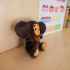 Soft Brown Monkey Plush Toy with Big Expressive Eyes & Fluffy Ears - Cuddly Stuffed Animal with Black & Brown Fuzzy Fur, Plush Fabric Body, Sitting