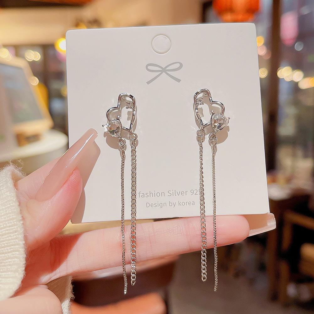 Серьги-кисточки с цирконами в форме сердца. Женские серьги High Sense. Новые серьги в сети. Серьги Celebrity Love Niche.