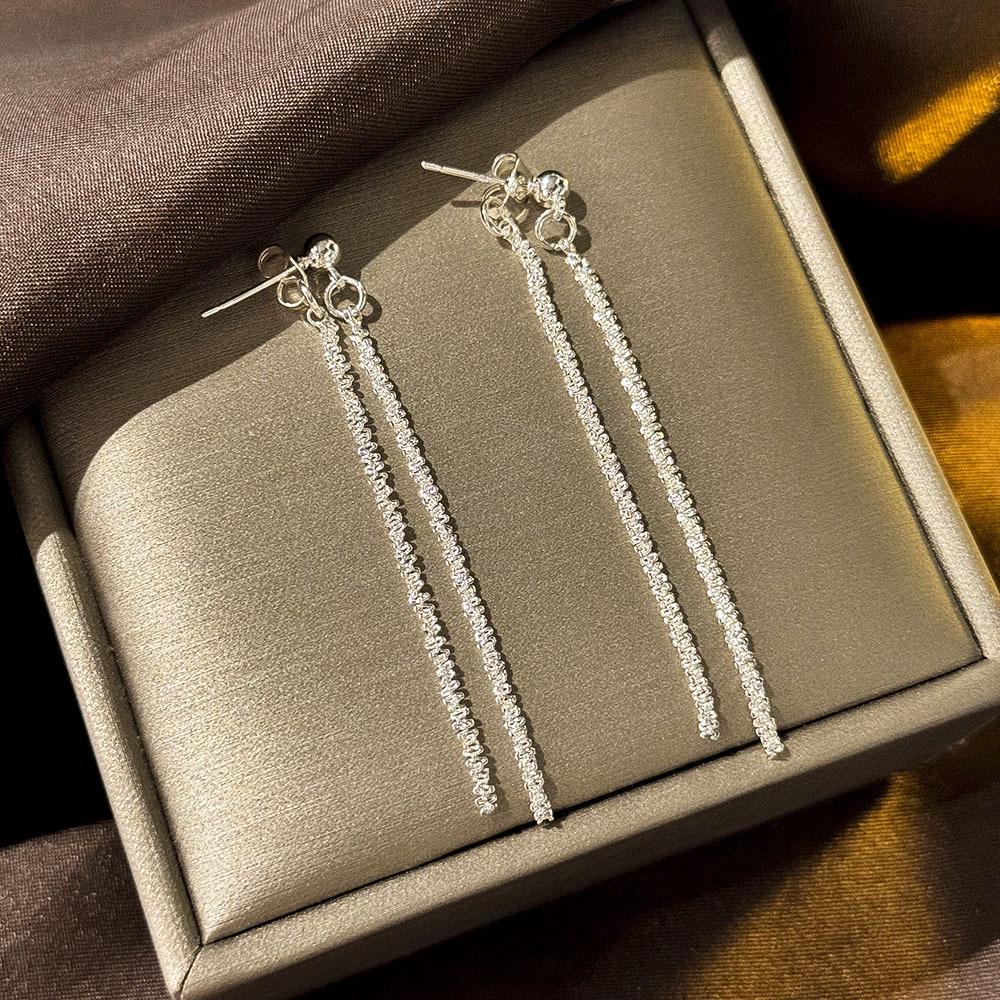 «Серьги-бантики из серебряных игл с жемчугом и цирконием»: Нишевый дизайн, стильный и универсальный, легкий роскошный аксессуар высокого класса.