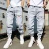 Men's Korean-Style Light Hip-Hop Workwear Jeans: Youth Slim-Fit Harem Pants, Loose Fit.
