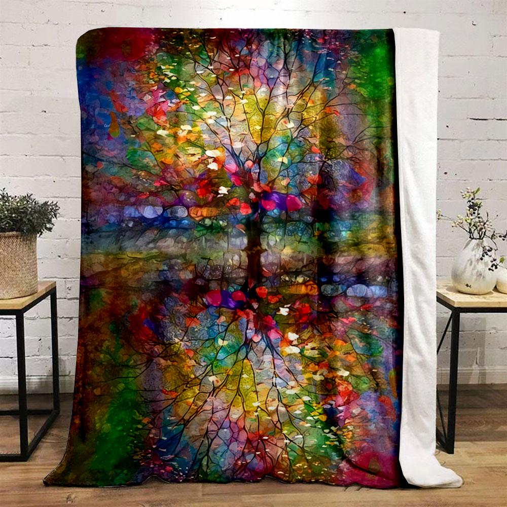 A vibrant mirrored tree with colorful abstract patterns and branches. for all seasons blanket lunch break throw gift