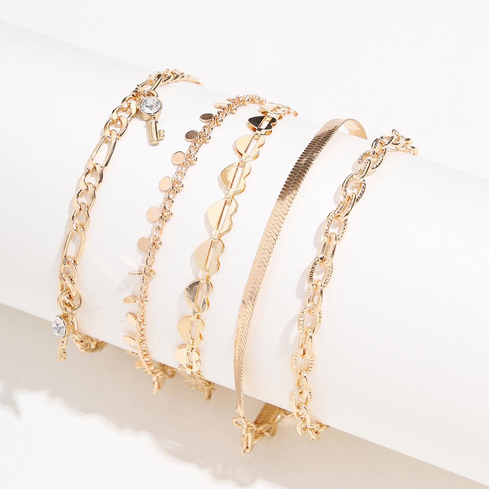 Набор браслетов на лодыжку в стиле панк с подвеской в виде сердца и ключа: Европейский и американский стиль, цепочка-змейка, кисточка, диск, бриллиантовые акценты - коллекция из 5 предметов