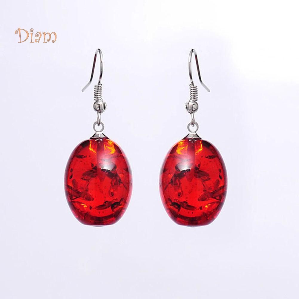 Овальные висячие серьги из искусственного янтаря