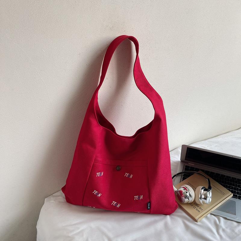 Canvas bag women's 2025 autumn new fashion shoulder bag large capacity commuting Korean niche design underarm bag