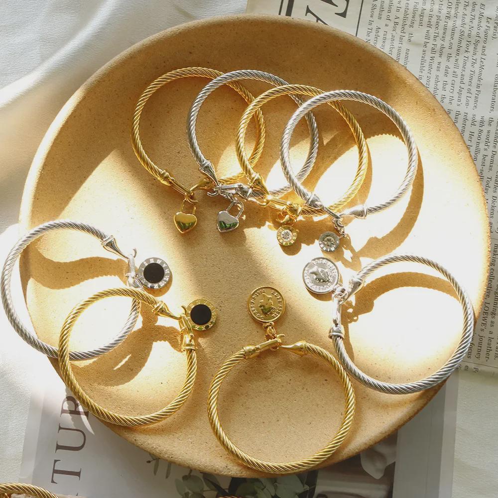 Элегантный браслет из нержавеющей стали с бриллиантовым акцентом и невыцветающей пряжкой в форме подковы