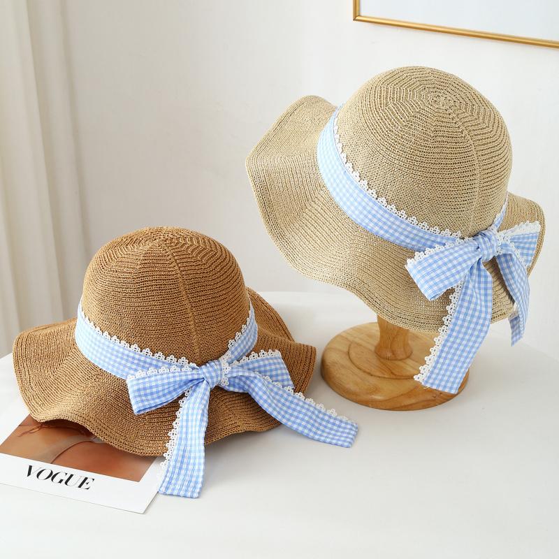 Новая летняя соломенная шляпа с волнистым бантом для взрослых женщин, стиль, сужающий лицо, солнцезащитная шляпа, защищающая от солнца