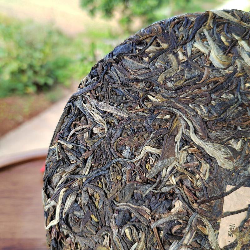 Соскабливающий чайный пирог Пуэр со стенами Иу Древнее дерево Сырой чай Первая весна Юньнаньский чай