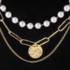 Stylish Multi-layer Pearl Necklace Featuring Unique Geometric Shape In Gold