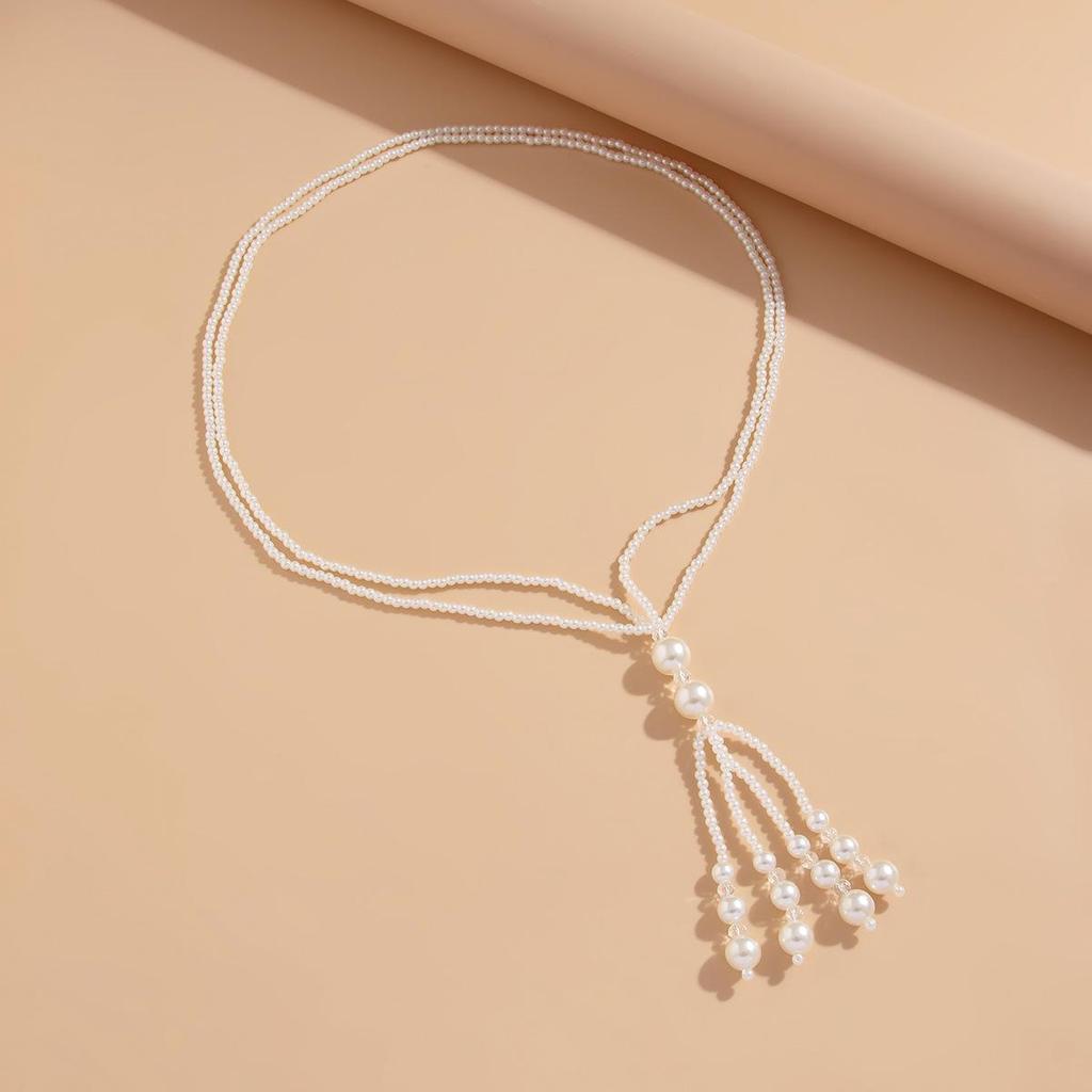 Ожерелье с кисточками из жемчуга в европейском и американском стиле: Элегантная длинная цепочка на ключицу с бусинами и кристаллами