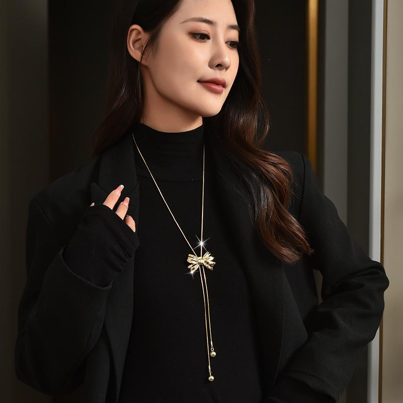 One And Two Autumn And Winter Sweater Chains Are Bow Tassel Long Necklace Temperament Brooch.