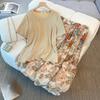 A Two-piece Set of Large-sized Women's Summer Fashion Pleated T-shirt and High-waisted A-line Floral Skirt