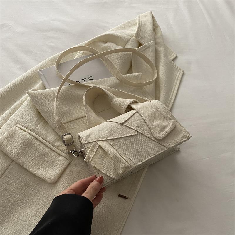 Дизайн-чувственная женская сумка Новый стиль индивидуальности Контрастная цветная сумка через плечо Сумка через плечо Niche Design Trendy Handbag