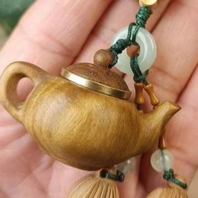 Брелок-подвеска на мобильный телефон из персикового дерева