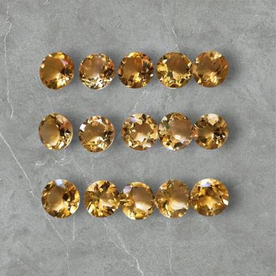 Лот натурального цитрина круглой огранки, лот ограненного цитрина, лот ограненного кабошона цитрина, лот драгоценных камней, ювелирные изделия из драгоценных камней.