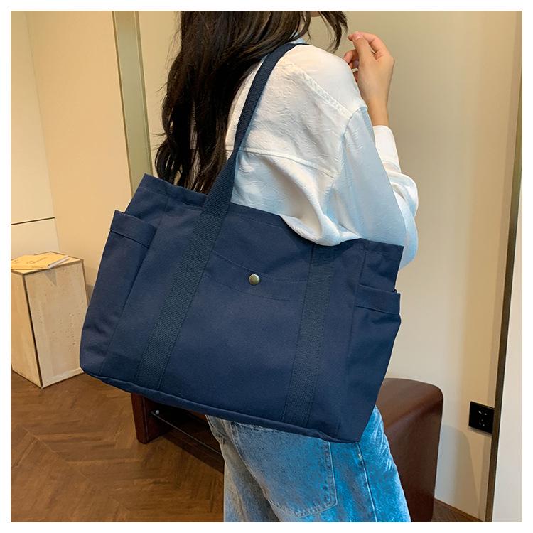 Женская холщовая сумка-тоут: Универсальная вместительная сумка с множеством карманов для студентов и пассажиров