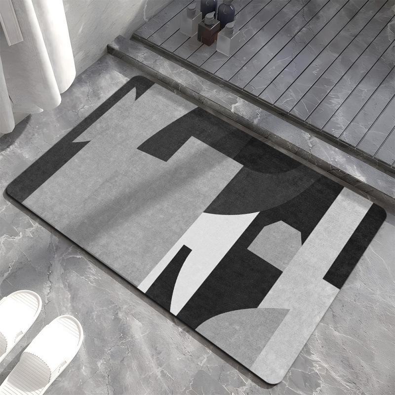 Коврик для ванной комнаты с геометрическим узором серого цвета — нескользящий, устойчивый к грязи и износу, простой в уходе. Идеально подходит для входов в скандинавском стиле.