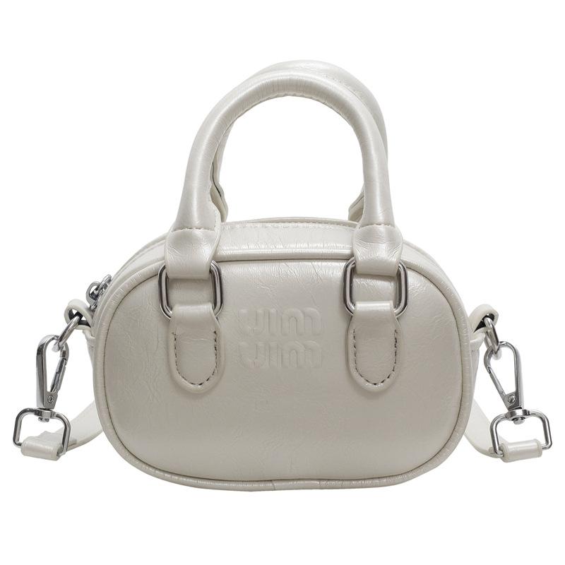 2025 новая маслянистая мини-сумка нишевая сумка для помады кроссбоди родительско-детская маленькая сумка-боулинг женская сумка