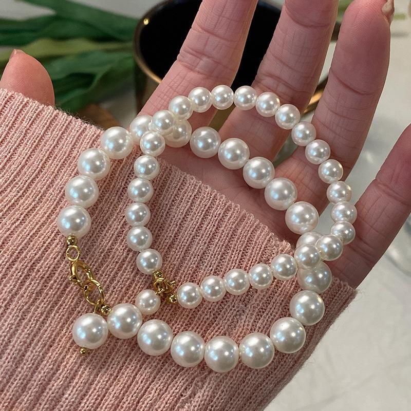 Искусственный жемчуг круглый прочный легкий браслет женский французский маленький аромат Хепберн стиль ювелирные изделия барокко ретро эластичные веревочные бусины