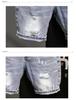 Men's Trendy Light Blue Ripped Denim Shorts, Korean Style Slim Fit with Distressed Pockets.
