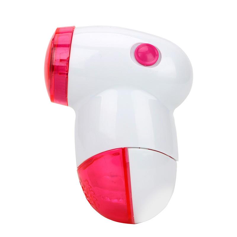 Машинка для удаления катышек с одежды. Работает от пальчиковых батареек